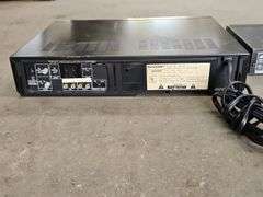 Samsung Progressive Scan Dvd Player & A Sharp Brand Professional Series VHS Player.