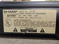 Samsung Progressive Scan Dvd Player & A Sharp Brand Professional Series VHS Player.