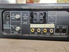 Samsung Progressive Scan Dvd Player & A Sharp Brand Professional Series VHS Player.