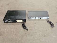 Samsung Progressive Scan Dvd Player & A Sharp Brand Professional Series VHS Player.