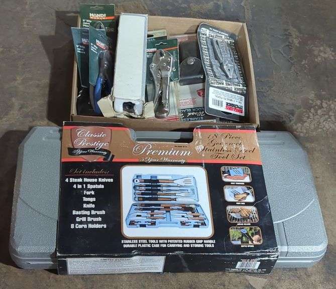 (U) Premium Grill set with assorted tools in packaging.