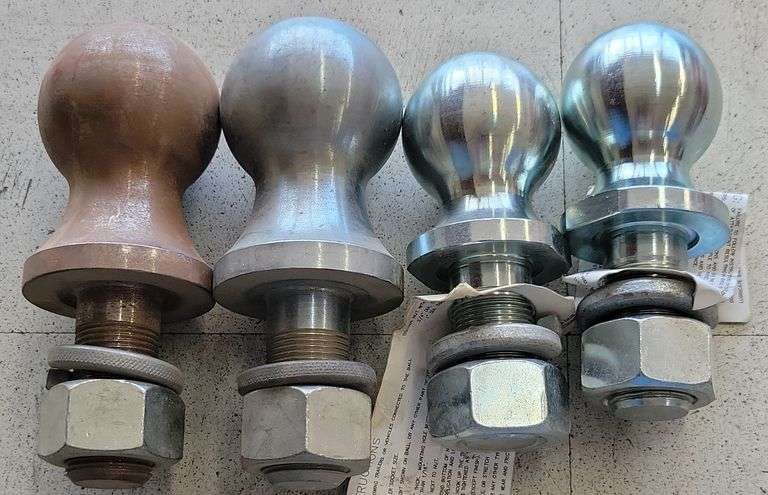 Two 2" And Two 2-5/16" Hitch Balls