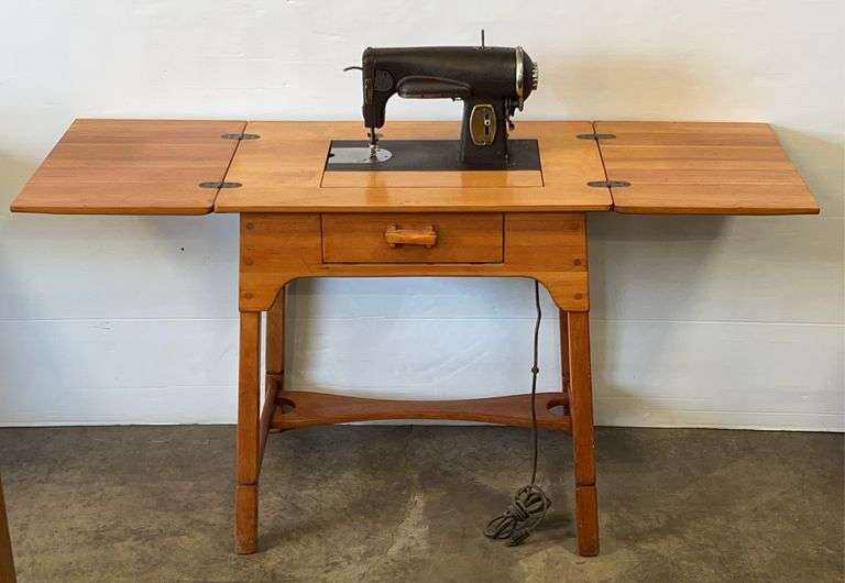(A) Vintage mid-century Kenmore sewing machine with a drop-leaf wooden ...