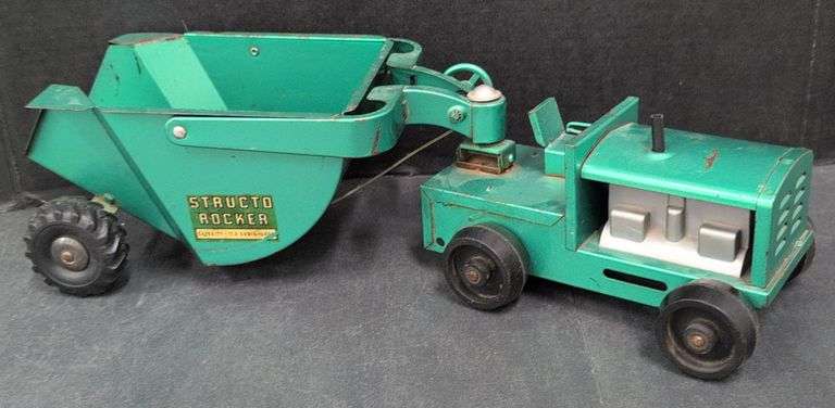 Structo Rocker Toy (M) Structo Pressed Steel Rocker Earth Mover - Kraft Auction Service, LLC