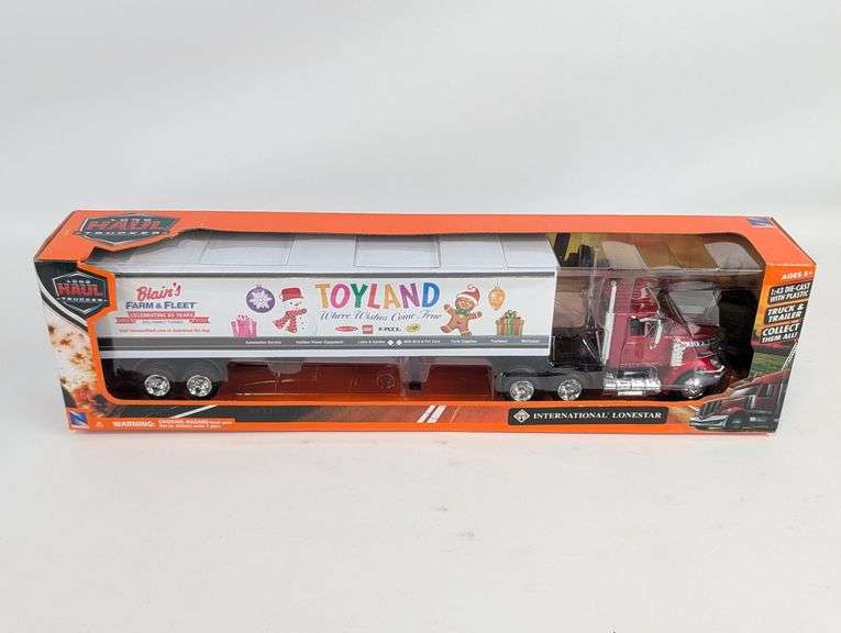 1/43 Scale International Lonestar Semi Truck with Toyland Trailer
