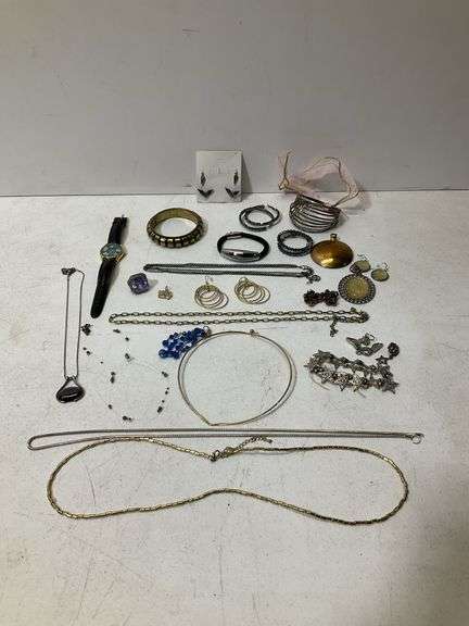 Misc jewelry lot: necklaces, earrings, pendants, bracelets, watch