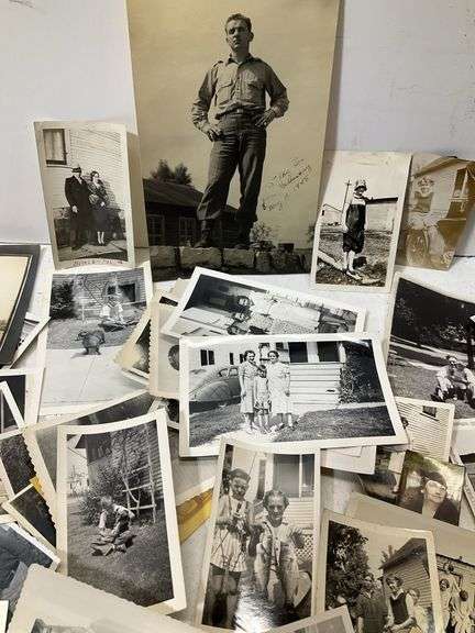 Clear tote of old pictures