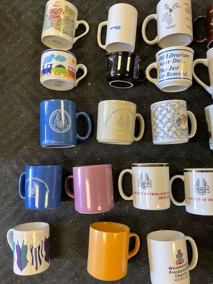 Blue tote of coffee mugs