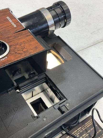Bell and Howell slide cube projector