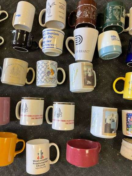 Blue tote of coffee mugs