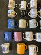 Blue tote of coffee mugs