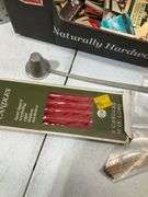 Matchbook collection with candles and holder