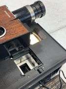 Bell and Howell slide cube projector