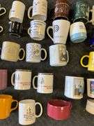 Blue tote of coffee mugs