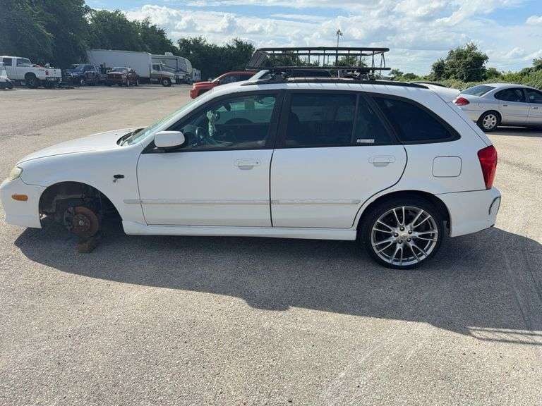 2002 MAZDA Protege VIN# JM1BJ245021614910 COMMENTS: NO KEY, ABAND, SEE DESCRIPTION