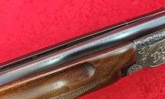 Sierra Arms Corp.   Model 90  12 ga.   O/U Trap Gun