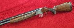 Sierra Arms Corp.   Model 90  12 ga.   O/U Trap Gun