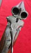 German   Double Bbl.   16 ga.   Guild Gun