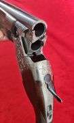 Sierra Arms Corp.   Model 90  12 ga.   O/U Trap Gun
