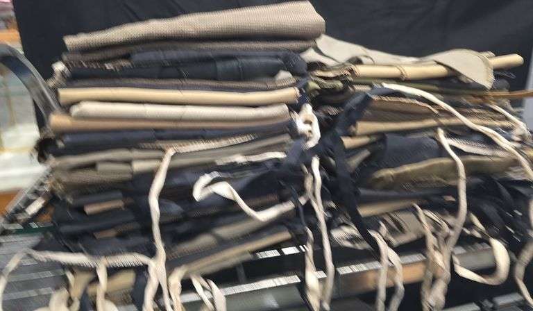 Large box of various soft gun sleeves