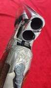 Sierra Arms Corp.   Model 90  12 ga.   O/U Trap Gun