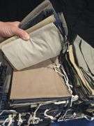 Large box of various soft gun sleeves