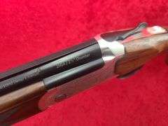 Stevens  Model 555  28 ga.   O/U Shotgun