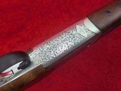 Stevens  Model 555  28 ga.   O/U Shotgun