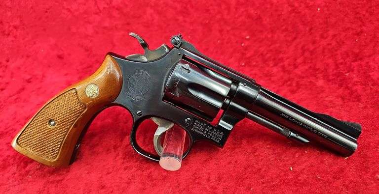 Smith & Wesson   18-3  22 cal.   Combat Masterpiece Revolver