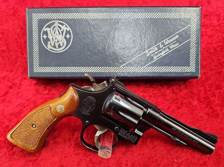 Smith & Wesson   18-3  22 cal.   Combat Masterpiece Revolver