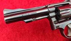Smith & Wesson   18-3  22 cal.   Combat Masterpiece Revolver