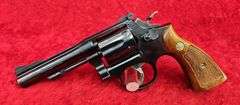 Smith & Wesson   18-3  22 cal.   Combat Masterpiece Revolver
