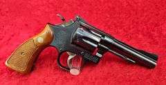 Smith & Wesson   18-3  22 cal.   Combat Masterpiece Revolver