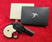 High Standard  Double   22 cal.   Derringer