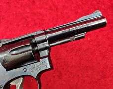 Smith & Wesson   18-3  22 cal.   Combat Masterpiece Revolver
