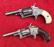 Pair of Antique Engraved Revolvers
