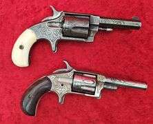 Pair of Antique Engraved Revolvers