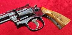 Smith & Wesson   18-3  22 cal.   Combat Masterpiece Revolver
