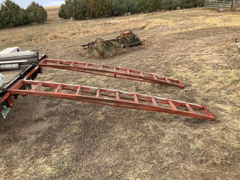 2 10 ft. Steel arch ramps, angle iron - Kraupie's Real Estate & Auctioneers