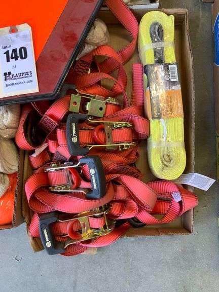 Four boxes, ratchet straps, gloves, slow moving vehicle sign