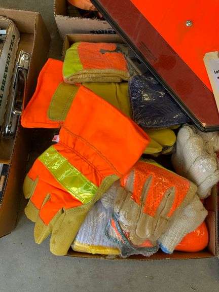 Four boxes, ratchet straps, gloves, slow moving vehicle sign