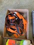 Four boxes, ratchet straps, gloves, slow moving vehicle sign