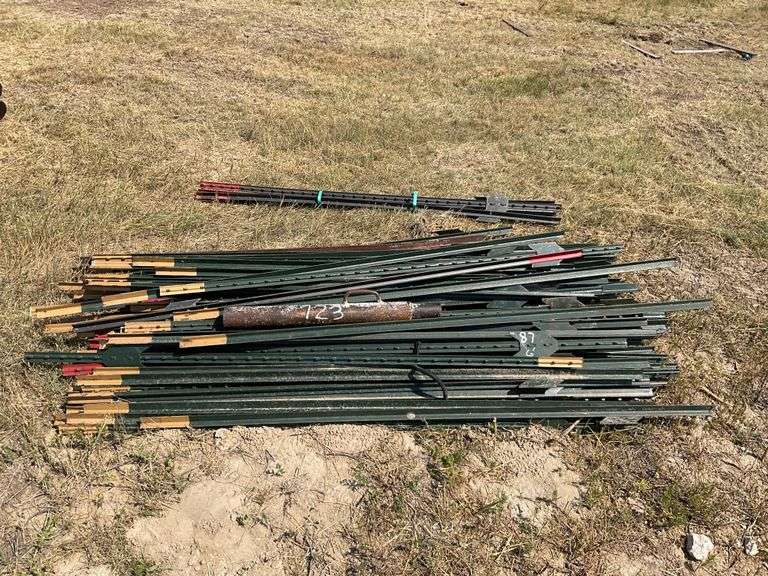 87- 6’ Steel Posts and Post Driver