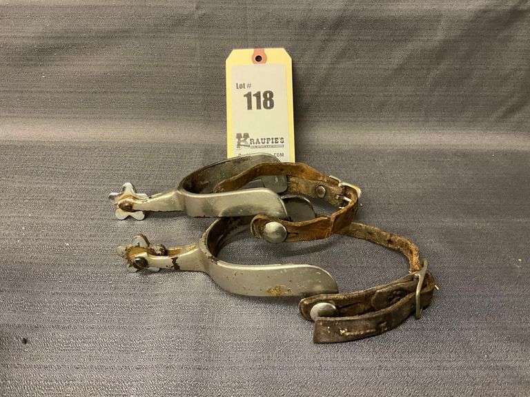 Vintage Spurs with Worn Straps