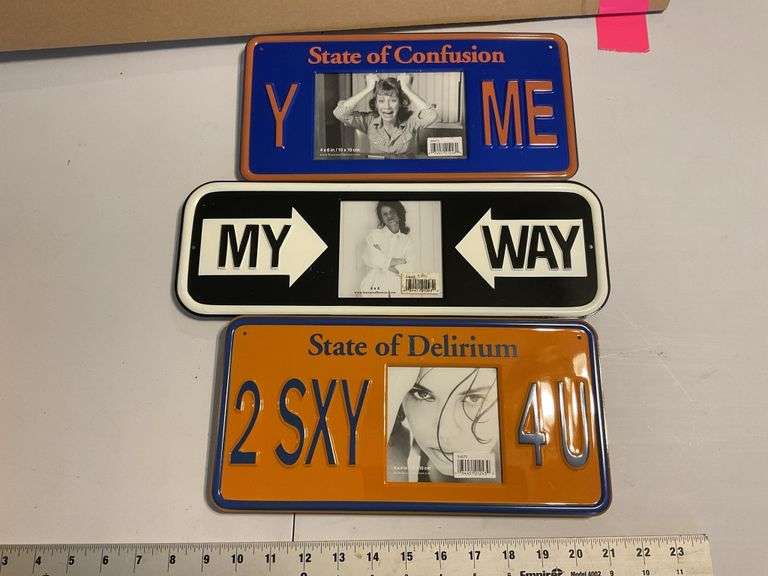 Vanity plate picture frames Legacy Auction Company