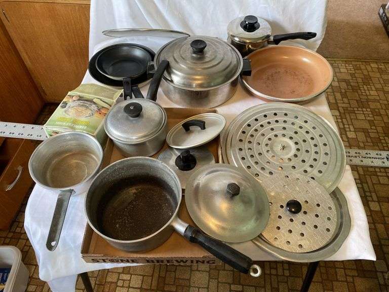 Assorted pots and pans - Legacy Auction Company