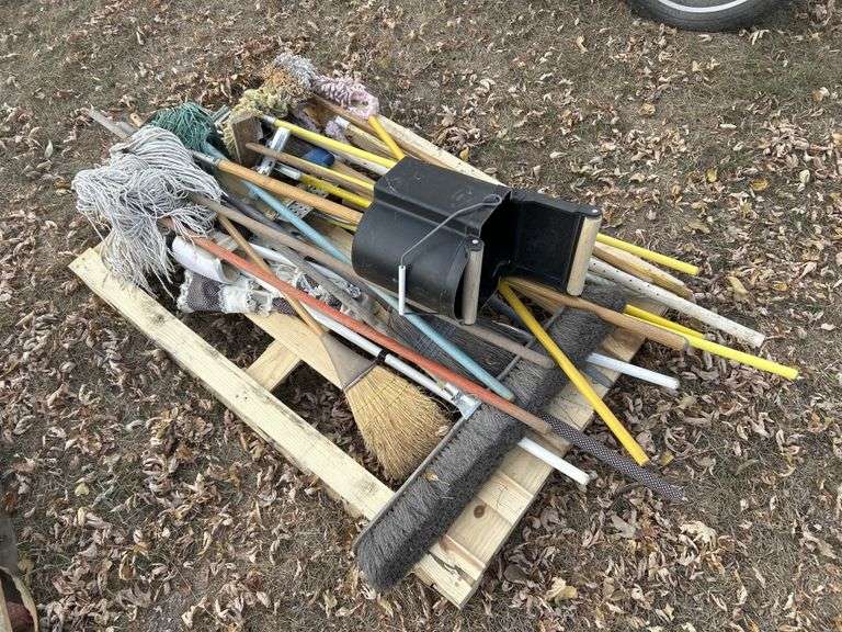 Pallet of mops, brooms, bucket, etc