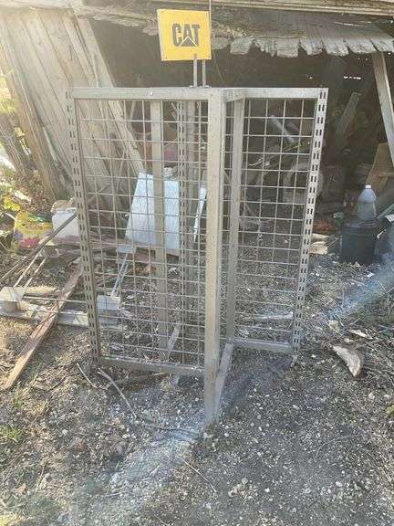 CAT display rack on casters - Legacy Auction Company