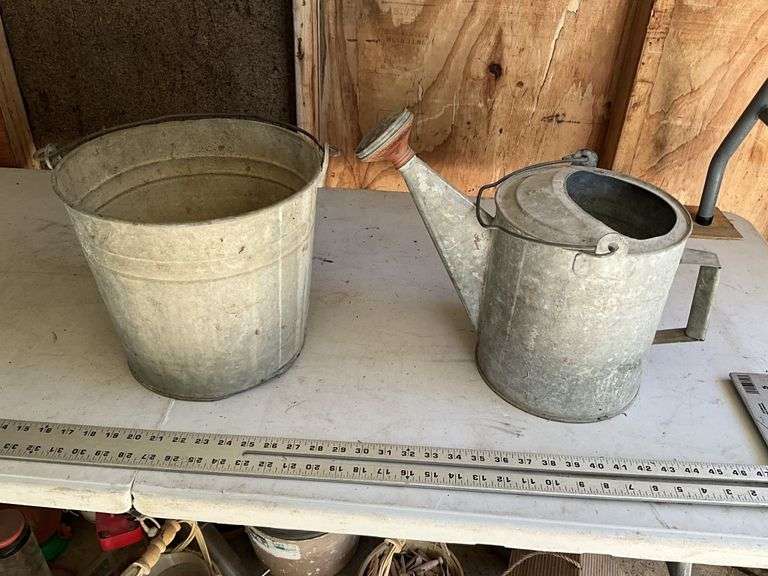 Galvanized bucket and watering can
