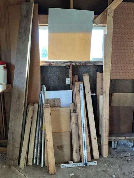 Assorted lumber and construction material